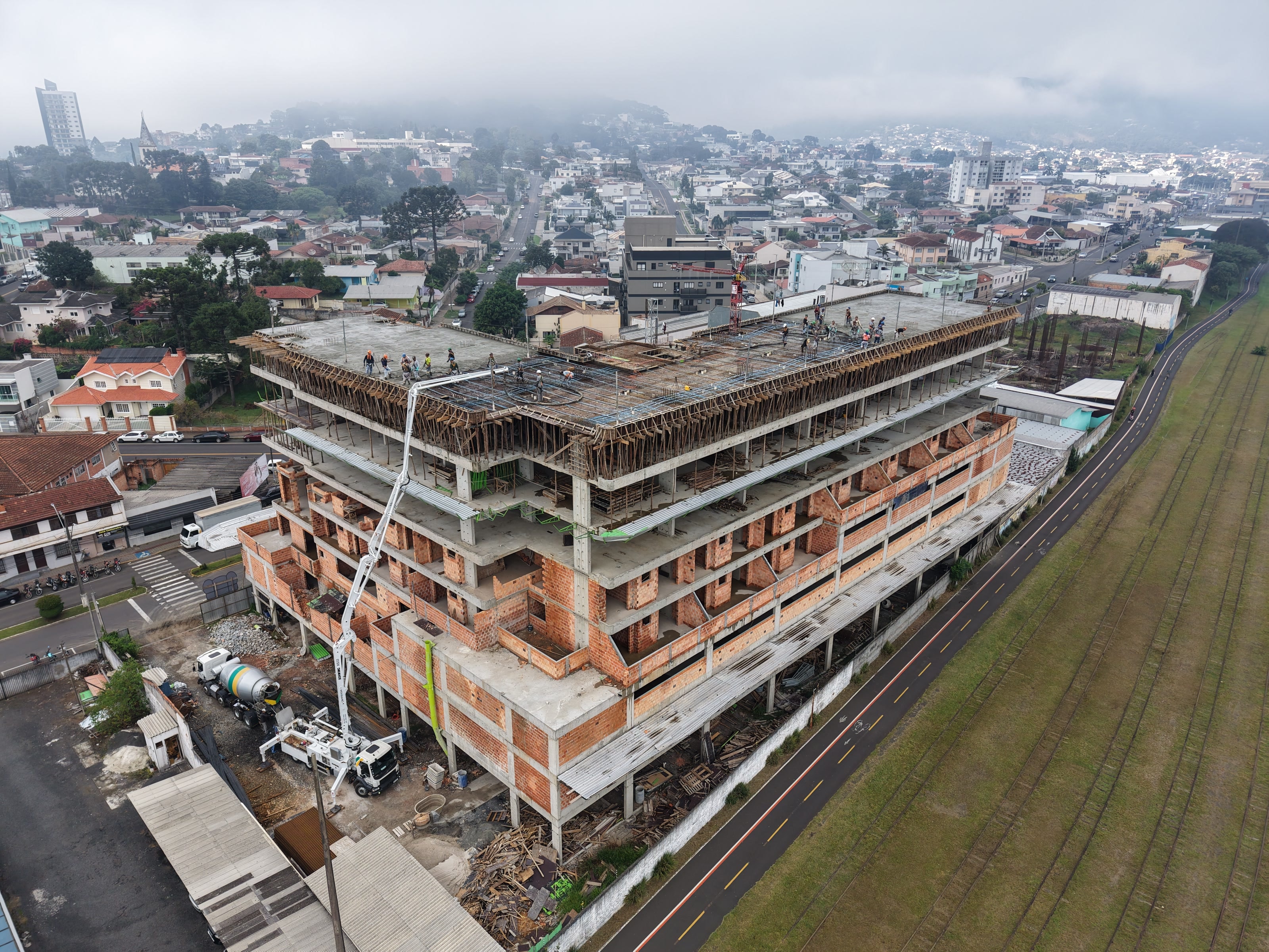 Vista aérea da obra do BËOS Grand Central em maio de 2026